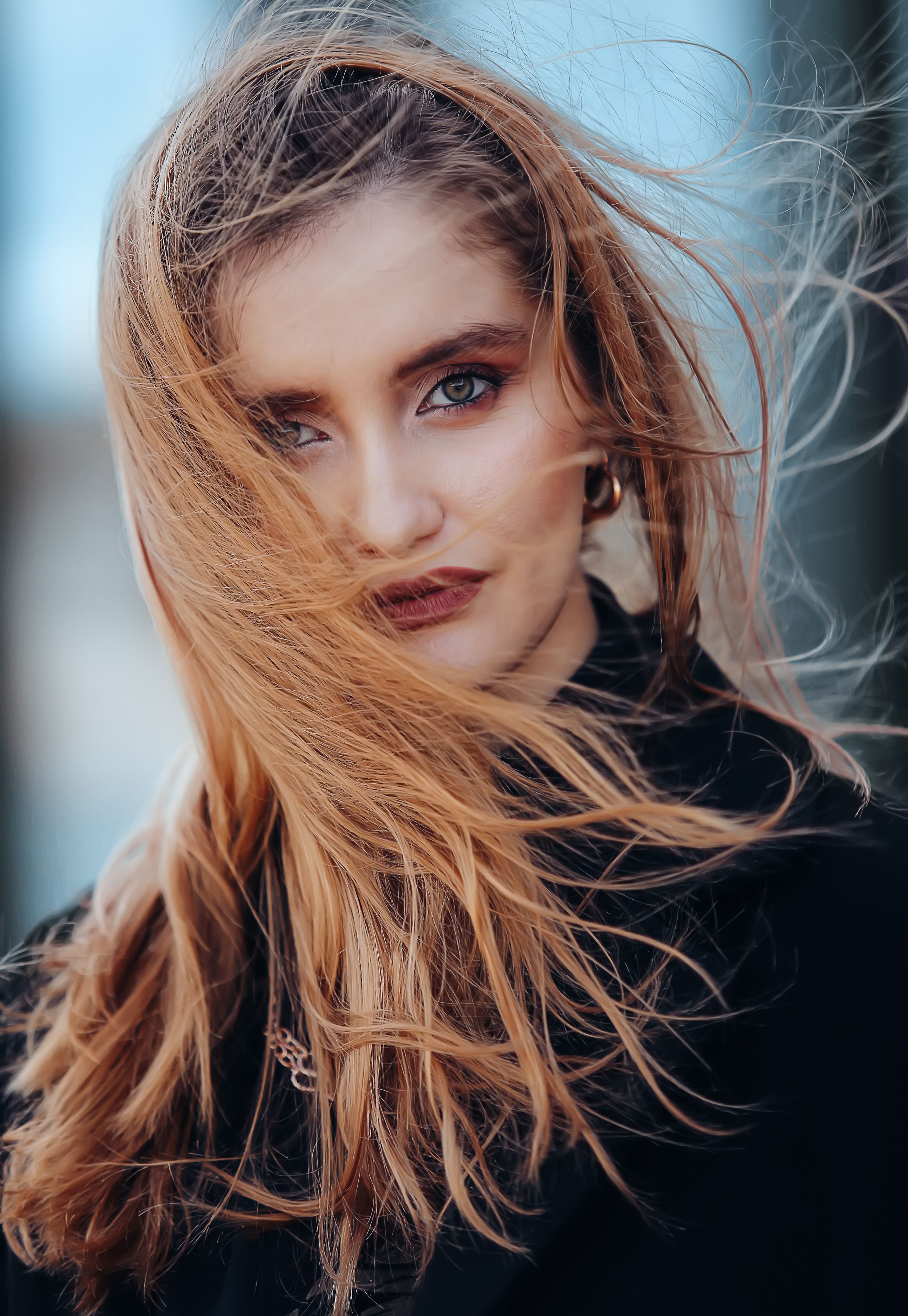 Woman in leather jacket in natural light