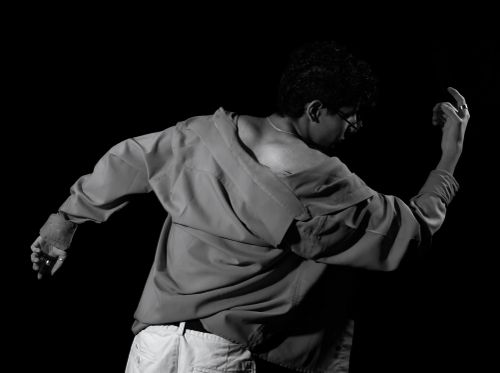 Free Expressive black and white photo of a dancer in a dynamic pose, showcasing movement art in Ciudad de México. Stock Photo