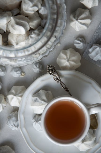 An elegant tea setting featuring Kenyan White Tea, showcasing its presentation in a luxury environment.