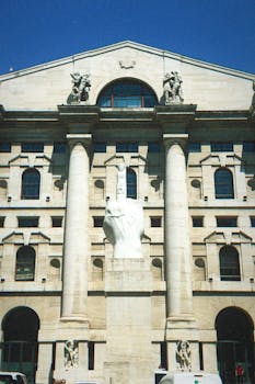 Front view of the L.O.V.E sculpture at Palazzo Mezzanotte in Milan.