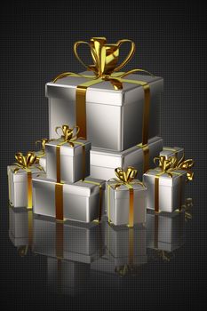 Luxurious silver gift boxes with gold ribbon, perfect for holidays and special occasions.