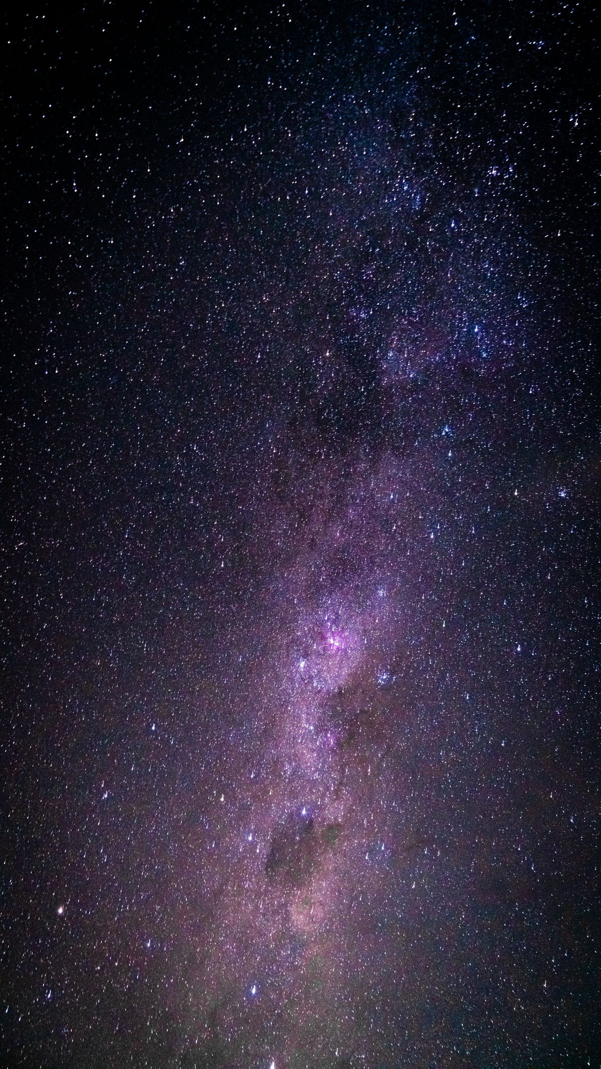 Milky Way stretching across a clear night sky — photo by Stevan Cetojevic on Pexels