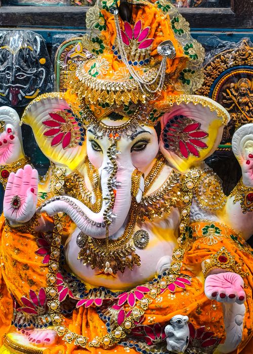 Free Intricate and colorful statue of Lord Ganesha, richly adorned with jewels and patterns. Stock Photo