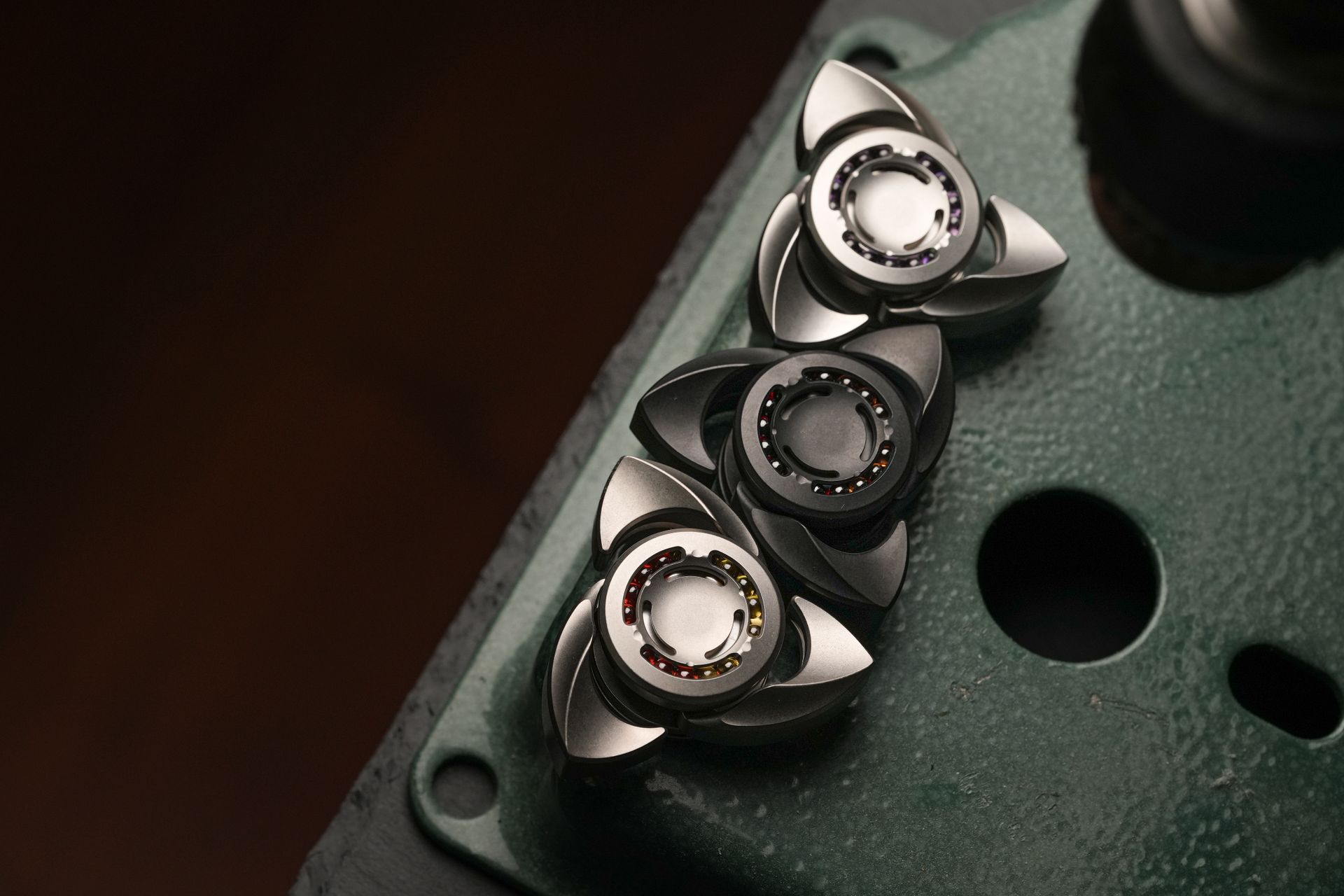 High-quality image of precision-engineered metal tool components showcased on a textured surface.