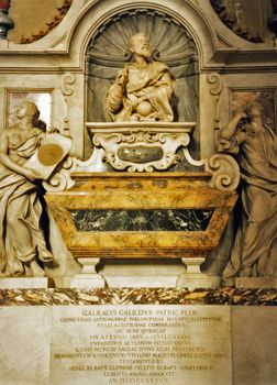 Detailed view of Galileo Galilei's Baroque tomb with sculptures and inscriptions.