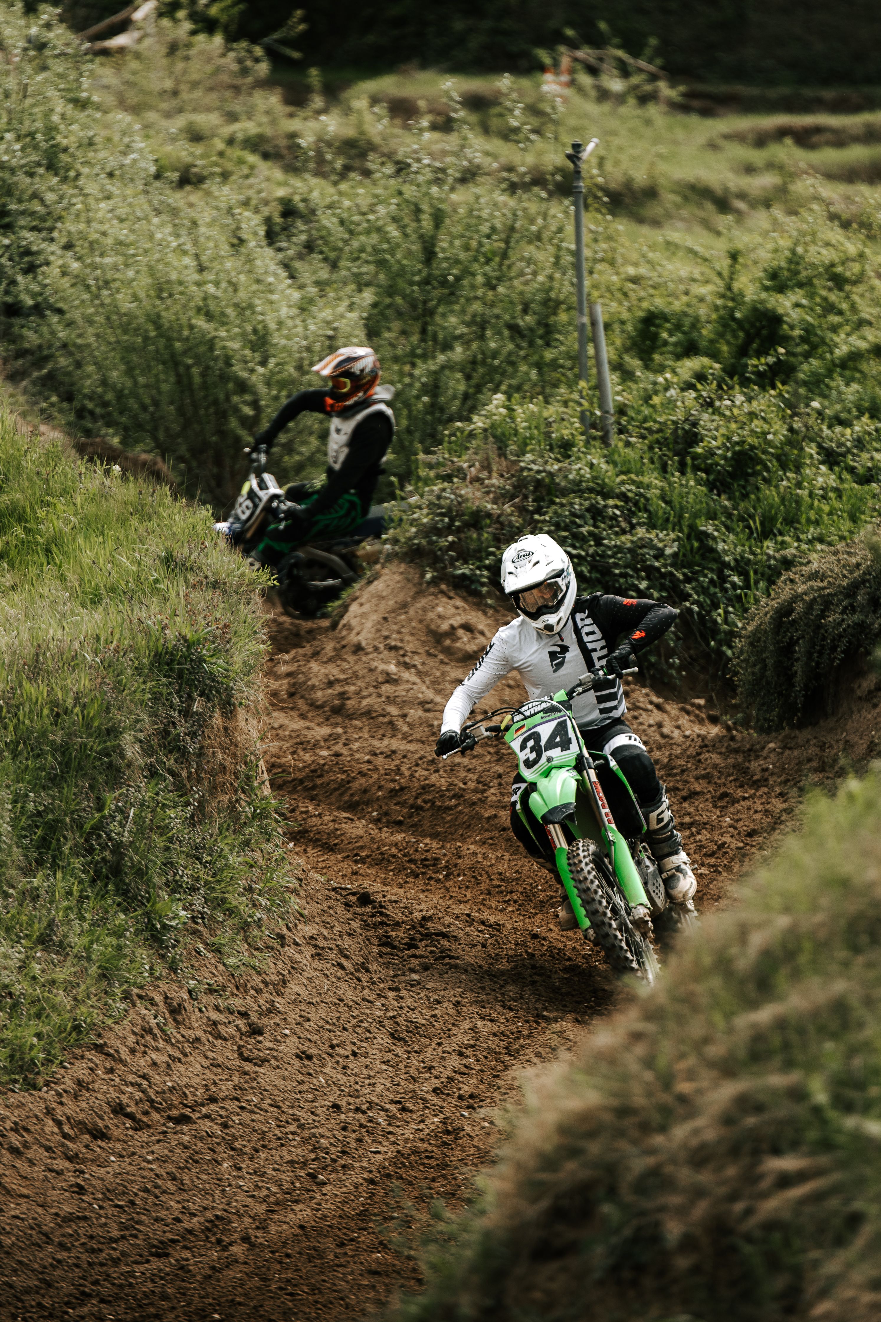 Thrilling Dirt Bike Race on Challenging Track · Free Stock Photo