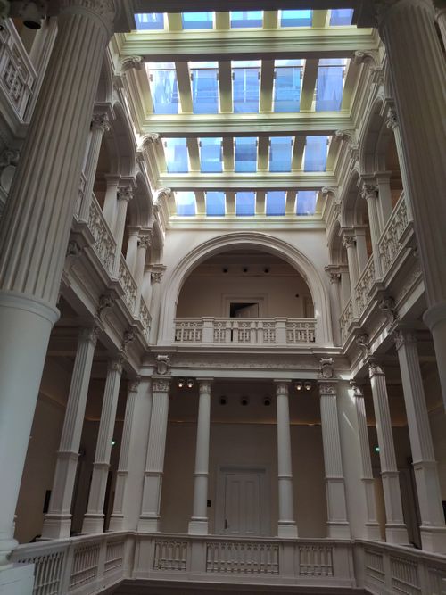 Free Beautiful neoclassical interior with tall columns and a skylight. Stock Photo
