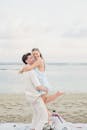 Romantic Beachside Couple Embracing at Sunset
