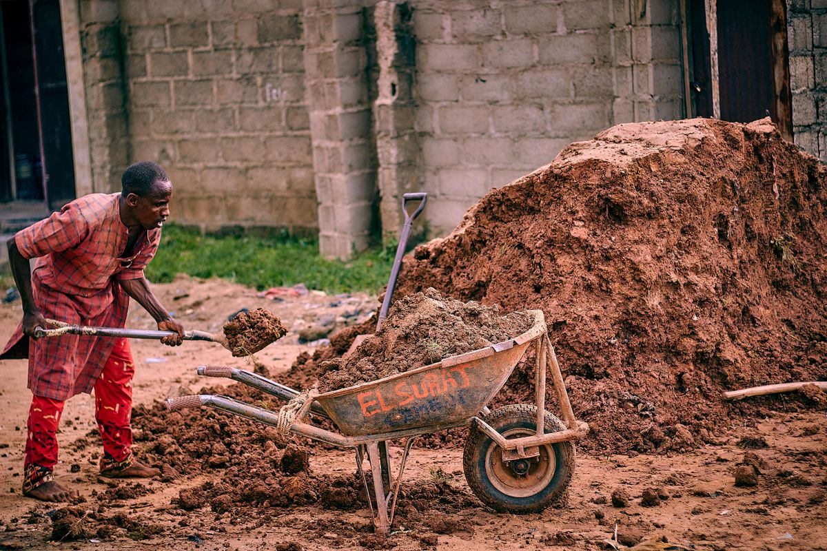 African worker doing site work