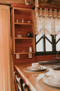 Warm and inviting rustic kitchen scene with vintage decor and soft natural light.