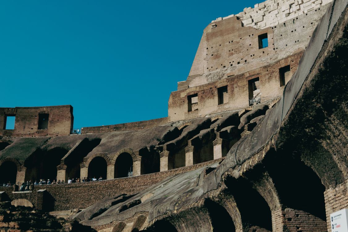 Underneath View Rome Historic Colosseum in Rome under Blue Sky · Free Stock Photo