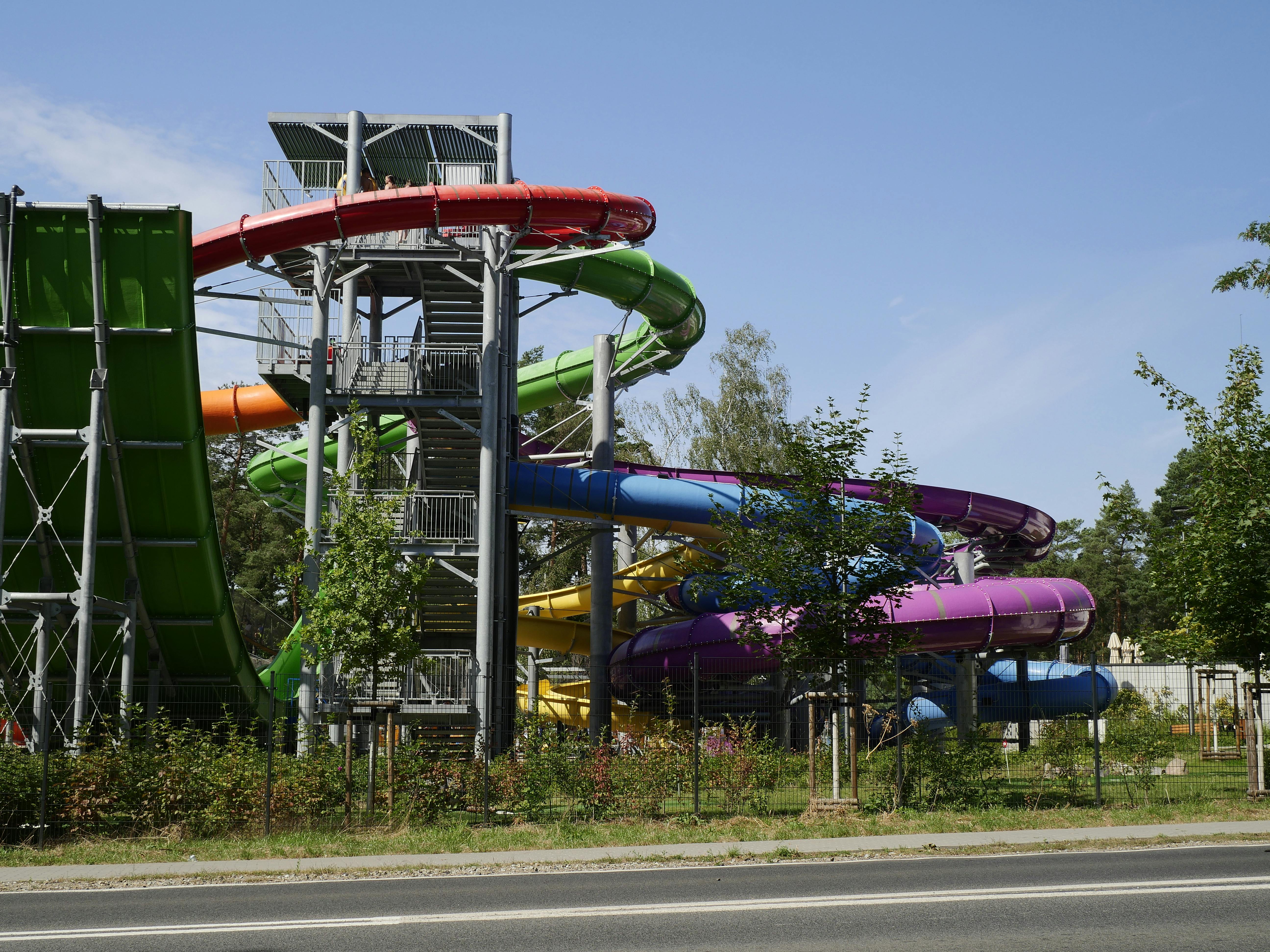 Vibrant outdoor water slides in Zielona Góra, perfect for summer fun and adventure.
