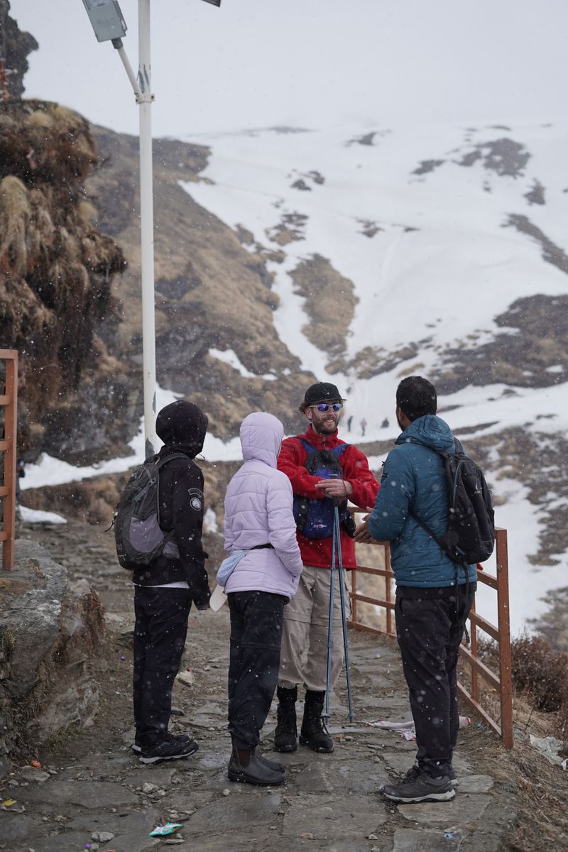 Digital marketing agency Dehradun - trekkers hiking in snowy mountains of Uttarakhand