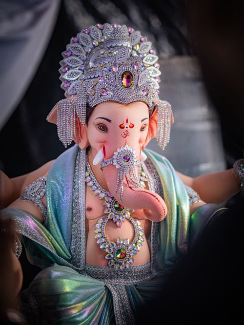 Free A detailed close-up of a beautifully adorned Lord Ganesha statue, showcasing fine craftsmanship. Stock Photo
