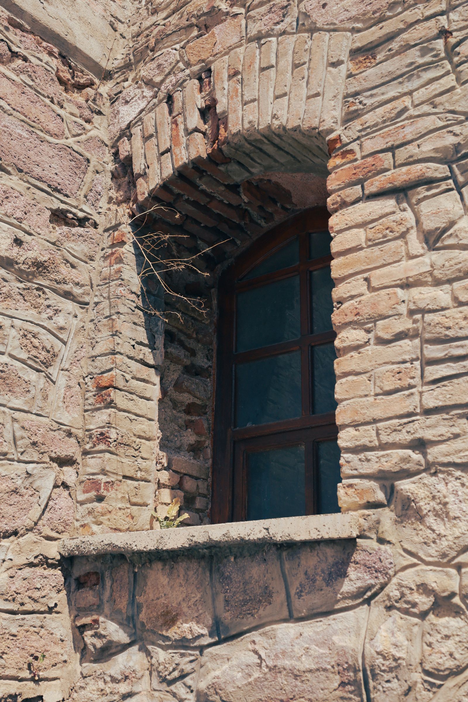Rustic Brick Wall with Weathered Wooden Window · Free Stock Photo