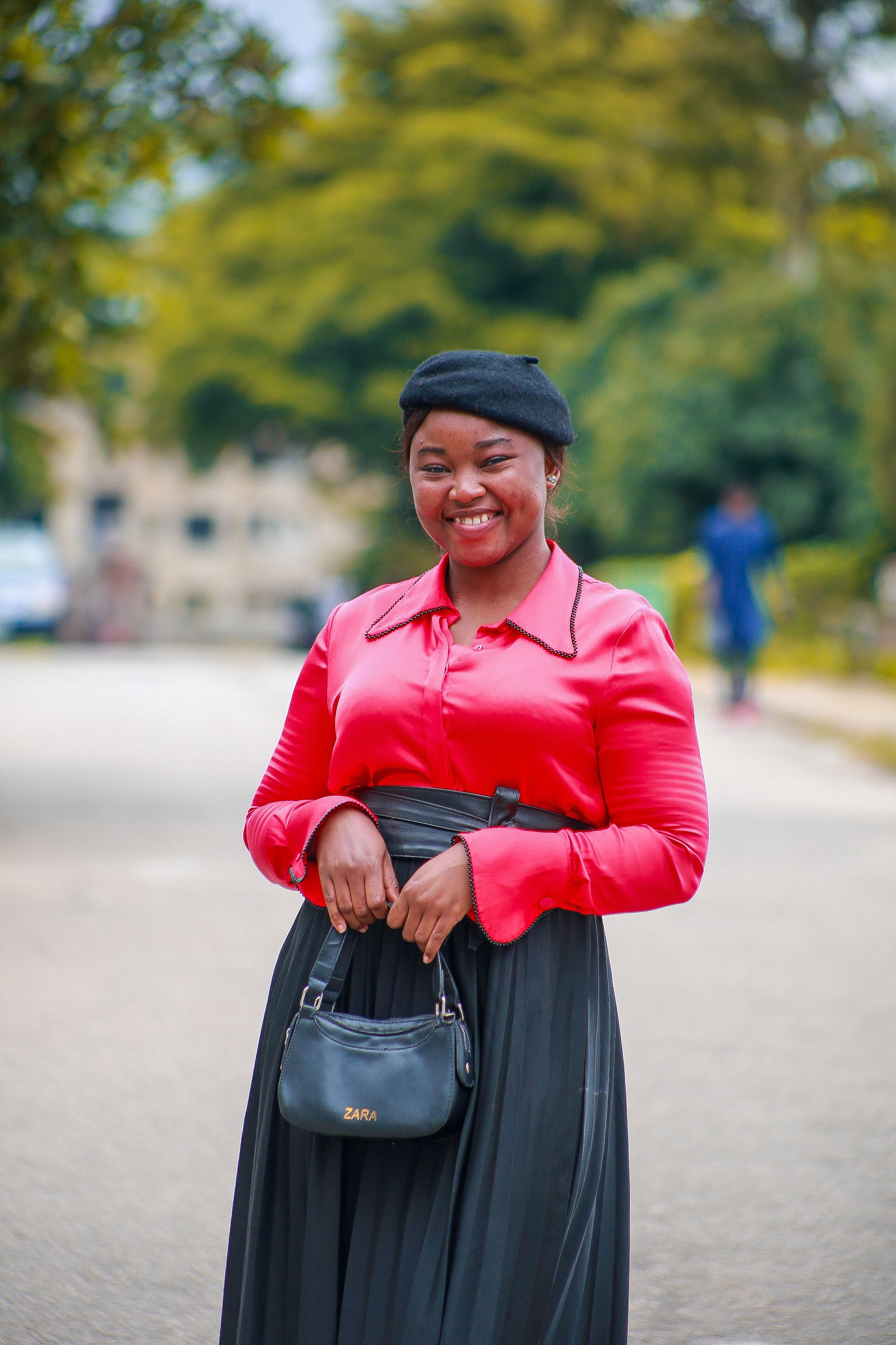 Smiling Woman in Stylish Outfit Outdoors · Free Stock Photo