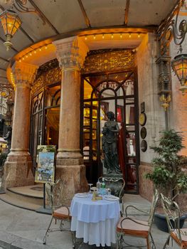 Elegant outdoor café with vintage architecture and decor in İstanbul, Türkiye.