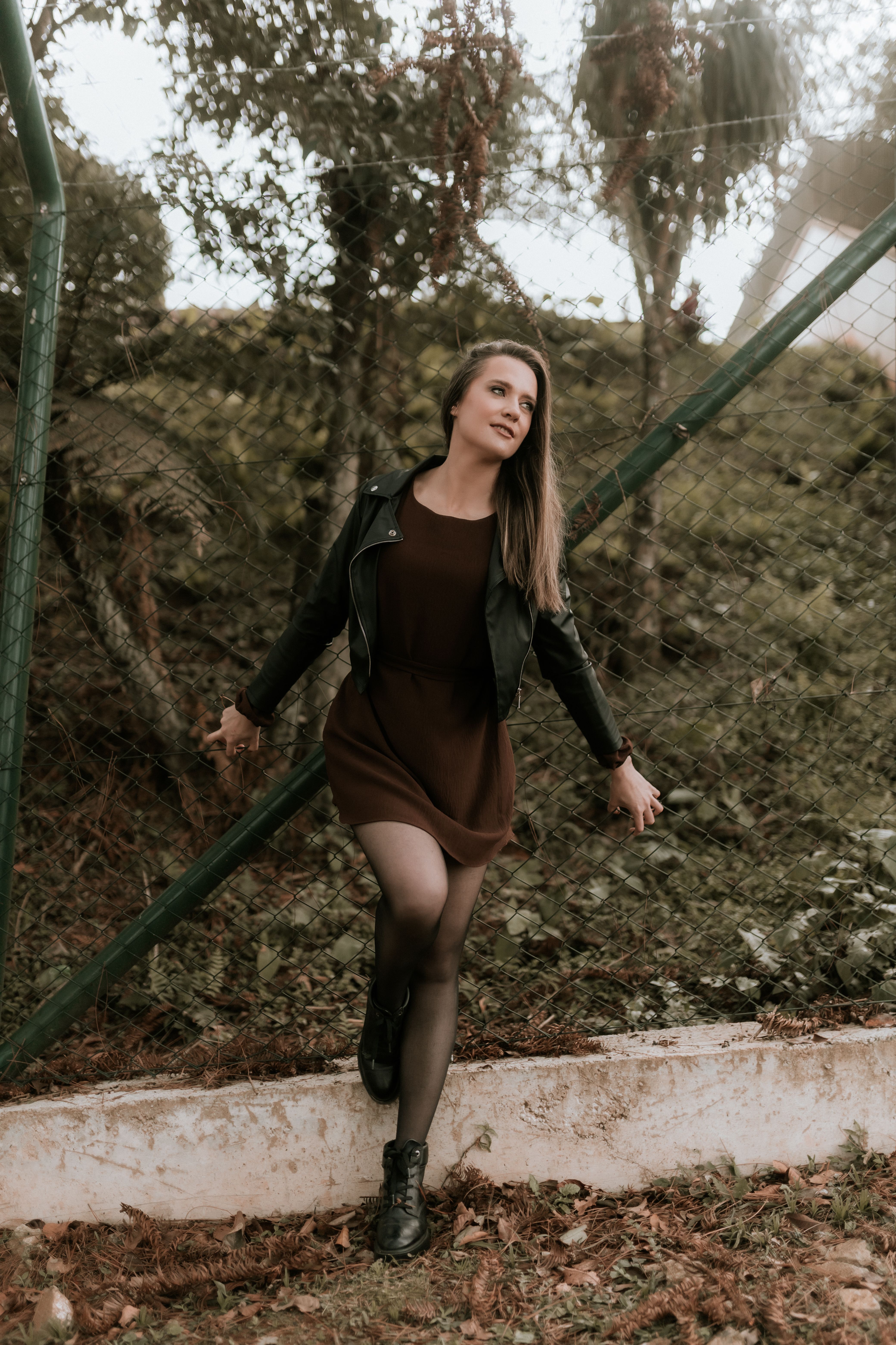 Stylish Woman Posing Outdoors in Nature · Free Stock Photo