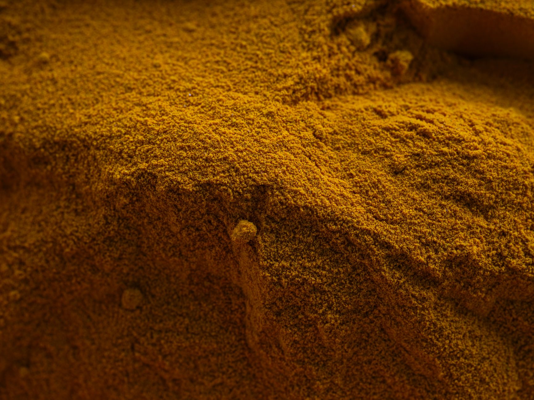 close-up of natural sleep ingredients including chamomile flowers, magnesium powder, and dried lavender arranged on a marble surface