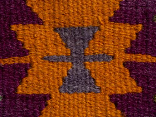 Free Detailed closeup of a colorful and traditional Turkish rug pattern, showcasing intricate design and texture. Stock Photo