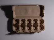 Empty Egg Carton on Neutral Background