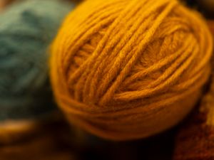 Close-up of ochre wool yarn — photo by Engin Akyurt on Pexels