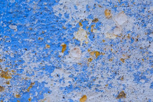 Free Close-up of an aged, weathered blue and white wall texture with a rustic appearance. Stock Photo