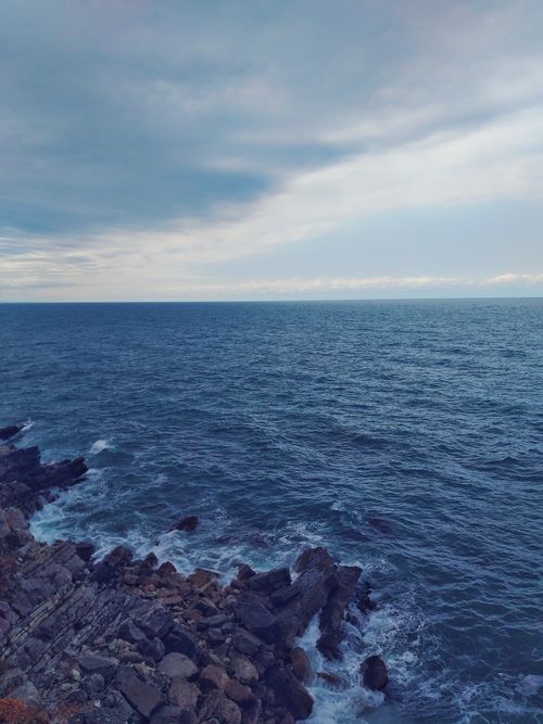 Free Tranquil sea horizon and rocky shore captured in Düzce, Turkey. Stock Photo