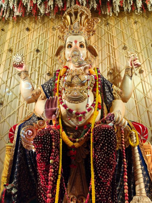 Free Magnificent statue of Lord Ganesha adorned with jewels during a festival in Kolkata. Stock Photo