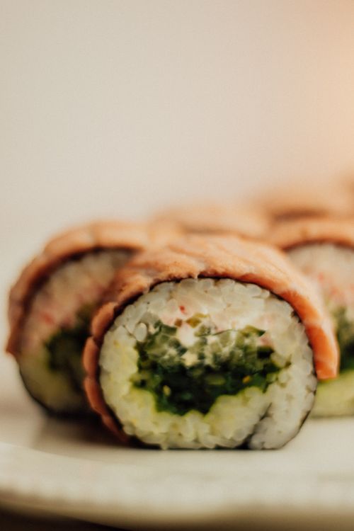 Free Appetizing sushi rolls with seaweed and fish filling, perfect for Japanese cuisine lovers. Stock Photo