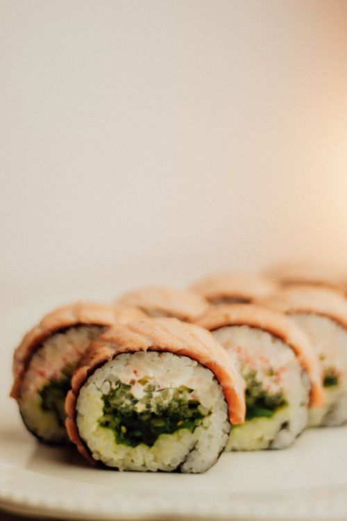 Free Close-up of freshly prepared sushi rolls, perfect for an Asian cuisine themed meal. Stock Photo