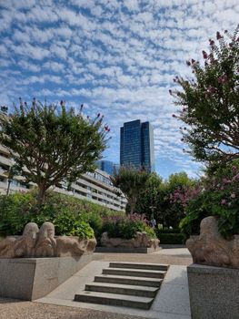 Scenic view of a garden with sculptures in a modern urban area of Île-de-France, France.