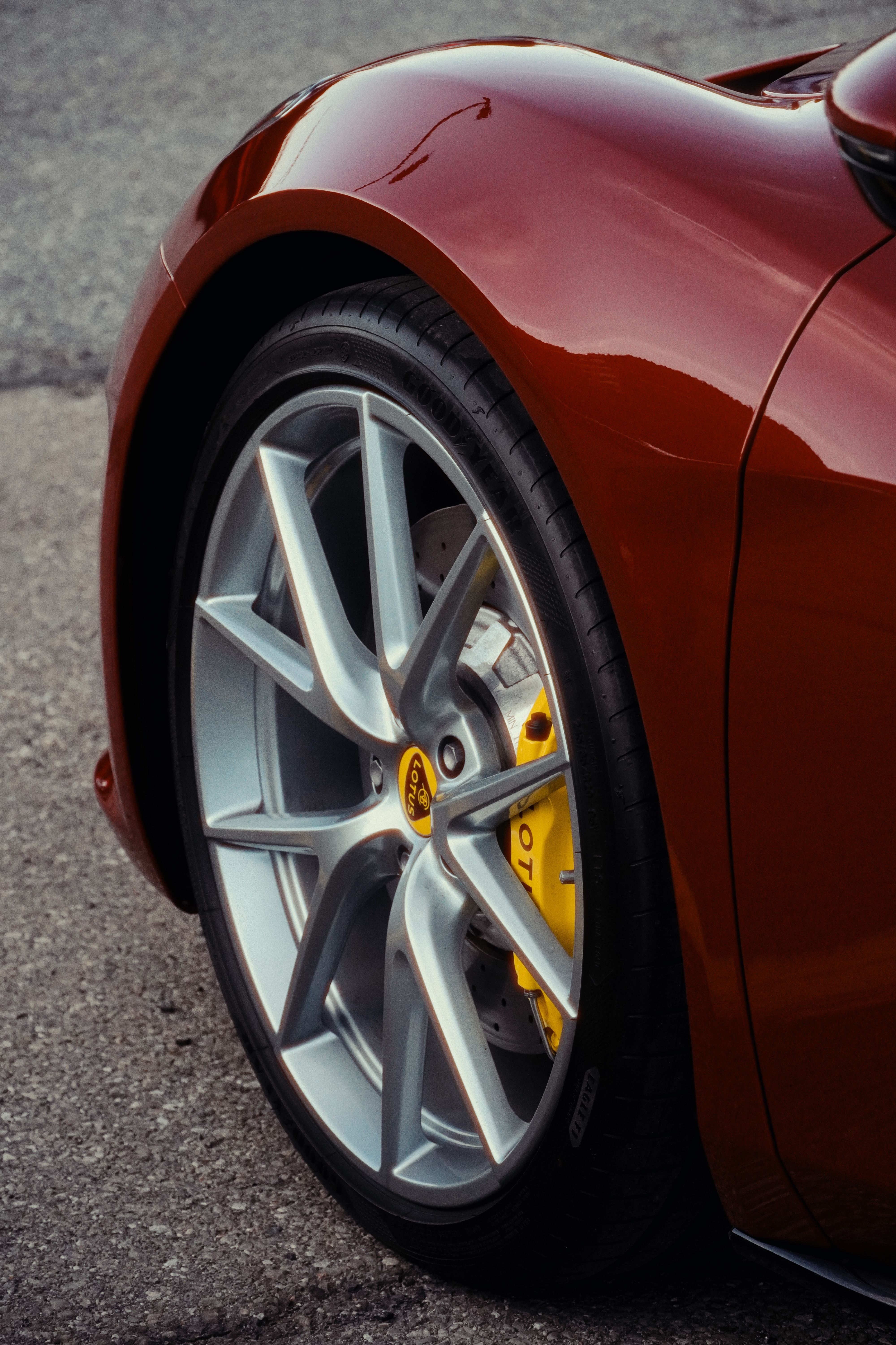 Sleek White Sports Car with Bronze Alloy Wheels · Free Stock Photo