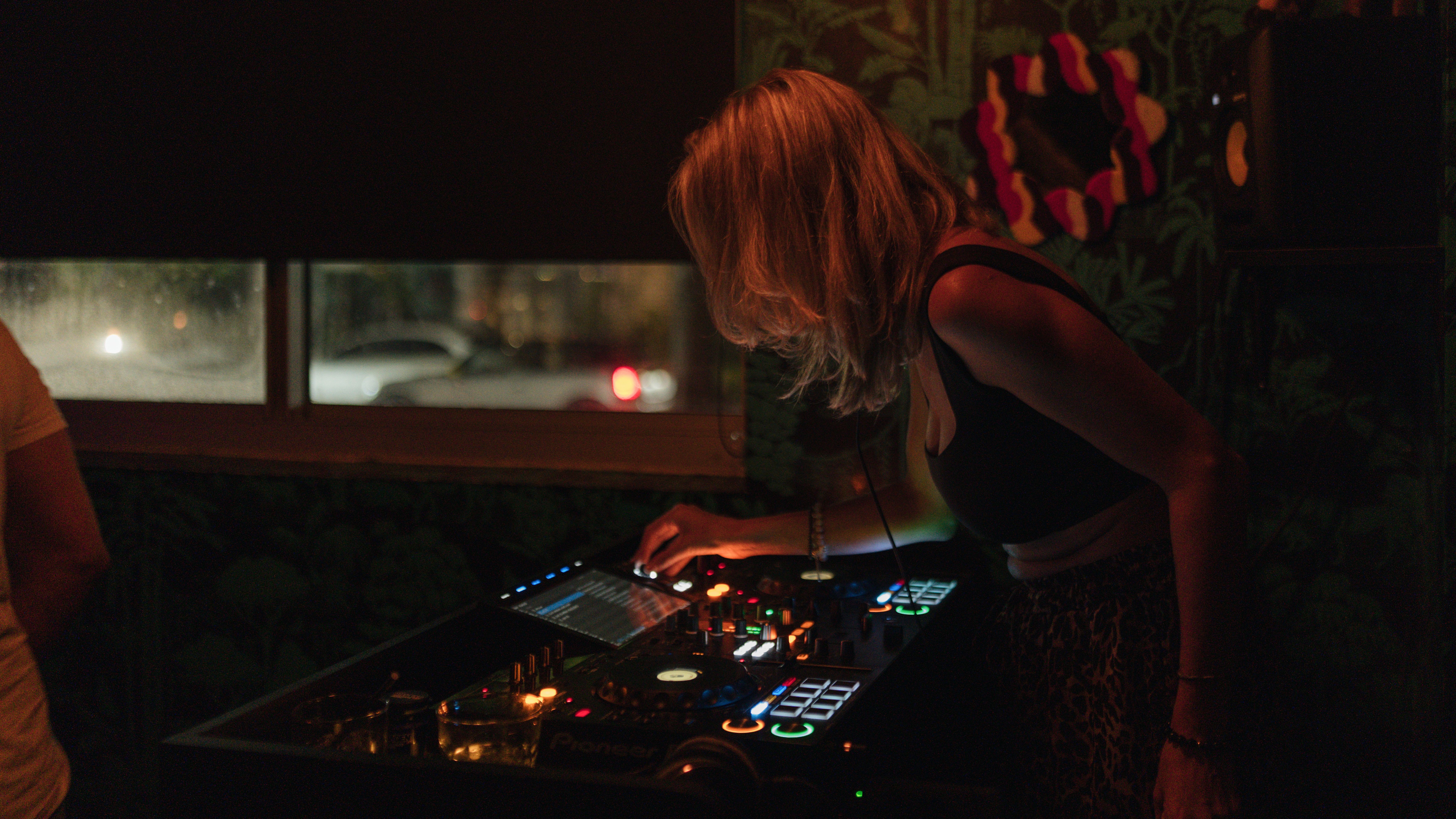 Female DJ Performing at a Nightclub Event · Free Stock Photo