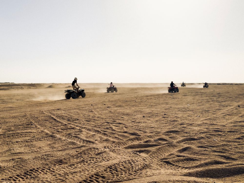 ATV Adventure in Vast Desert Landscape · Free Stock Photo