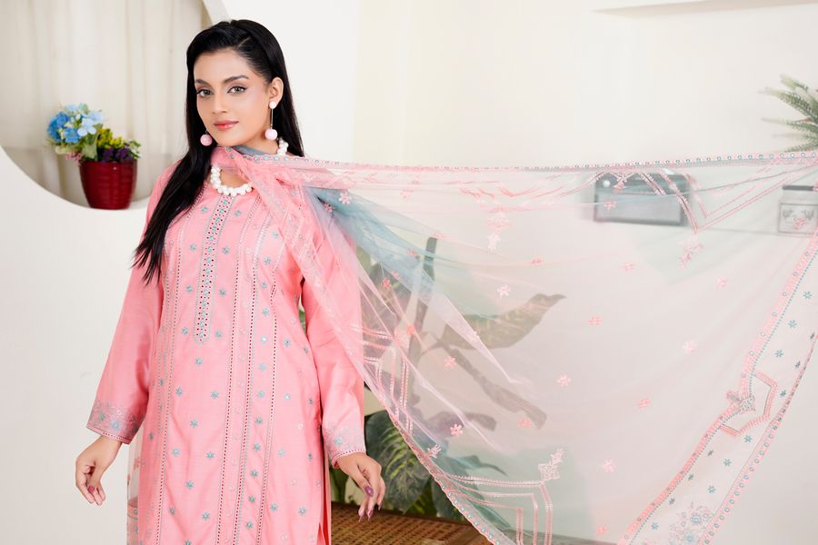 Elegant South Asian fashion model in a refined open-neck traditional outfit