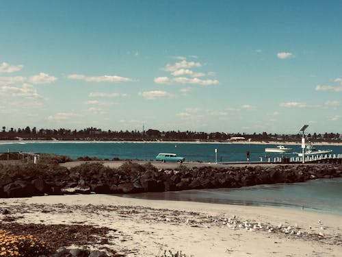 Blue Vehicle on Dock