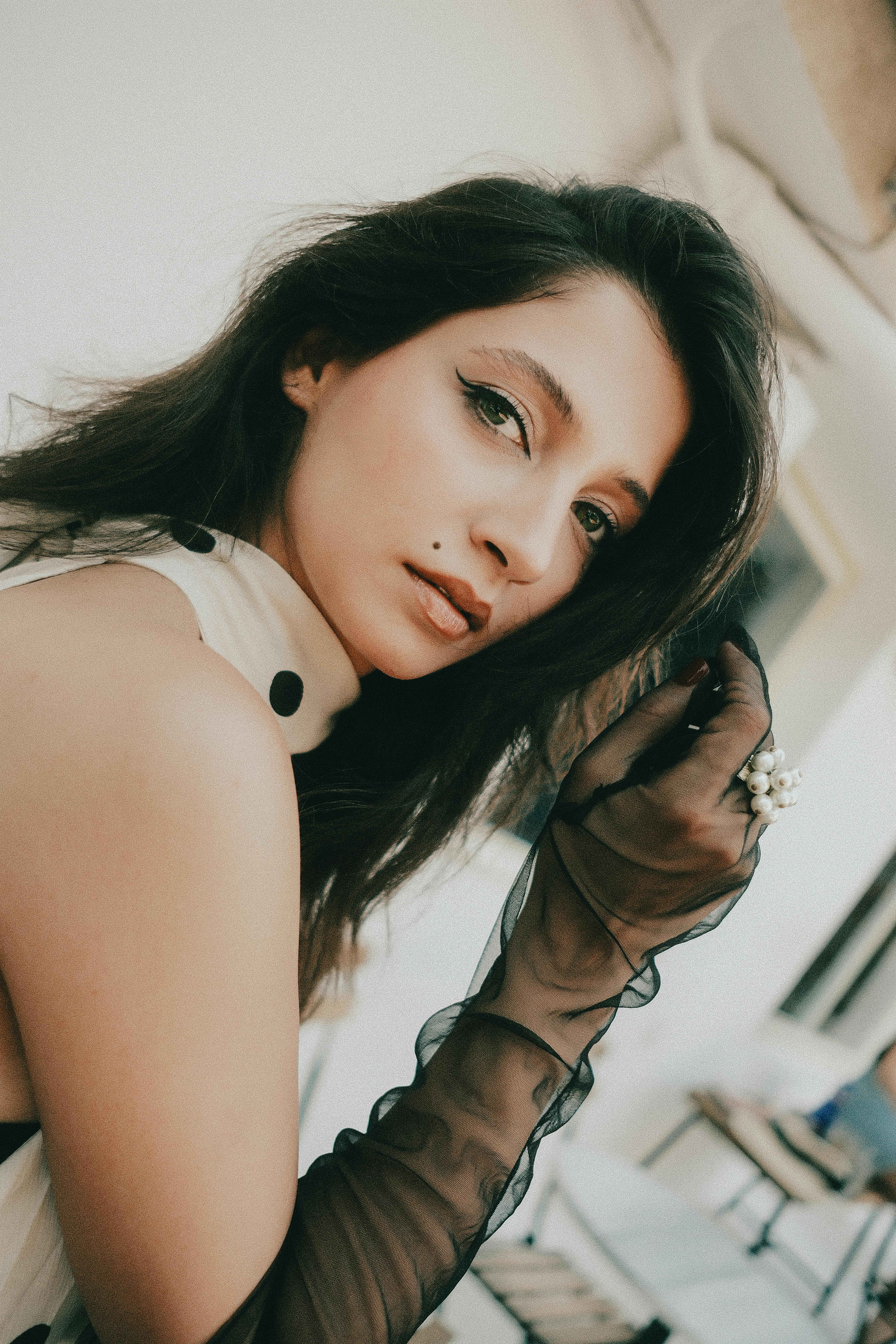 Portrait of a stylish woman in Istanbul with vintage fashion elements, exuding grace and charm.