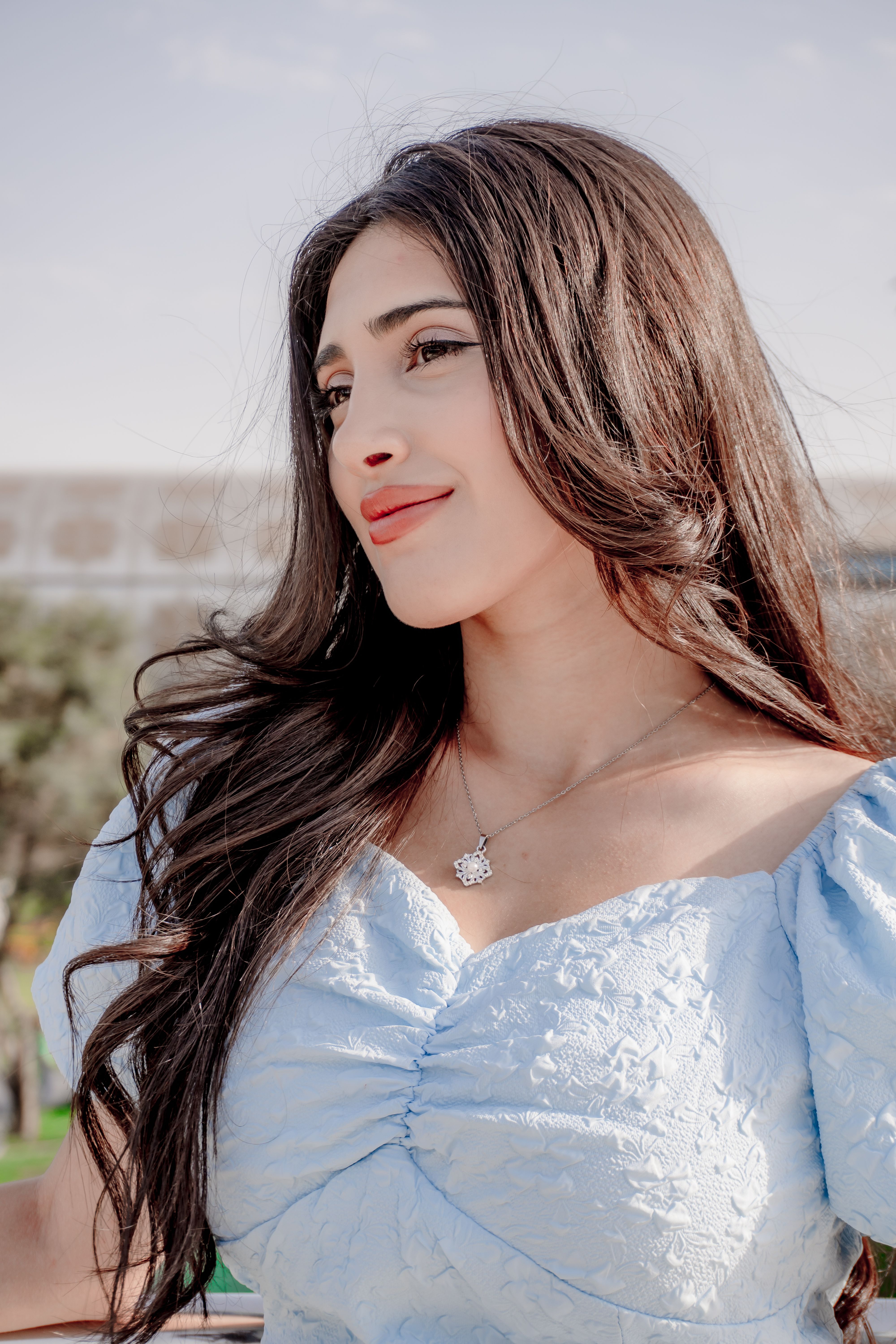 Stylish Woman in Elegant Blue Dress Outdoors