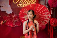 Elegant Portrait of Woman with Red Parasol