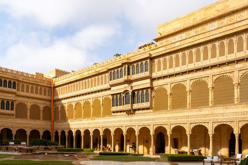 Free A stunning view of Suryagarh Hotel's courtyard in Jaisalmer, showcasing traditional Rajasthan architecture. Stock Photo