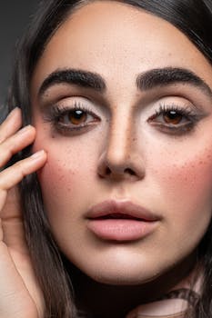 Detailed close-up portrait of a woman with natural makeup and expressive eyes.