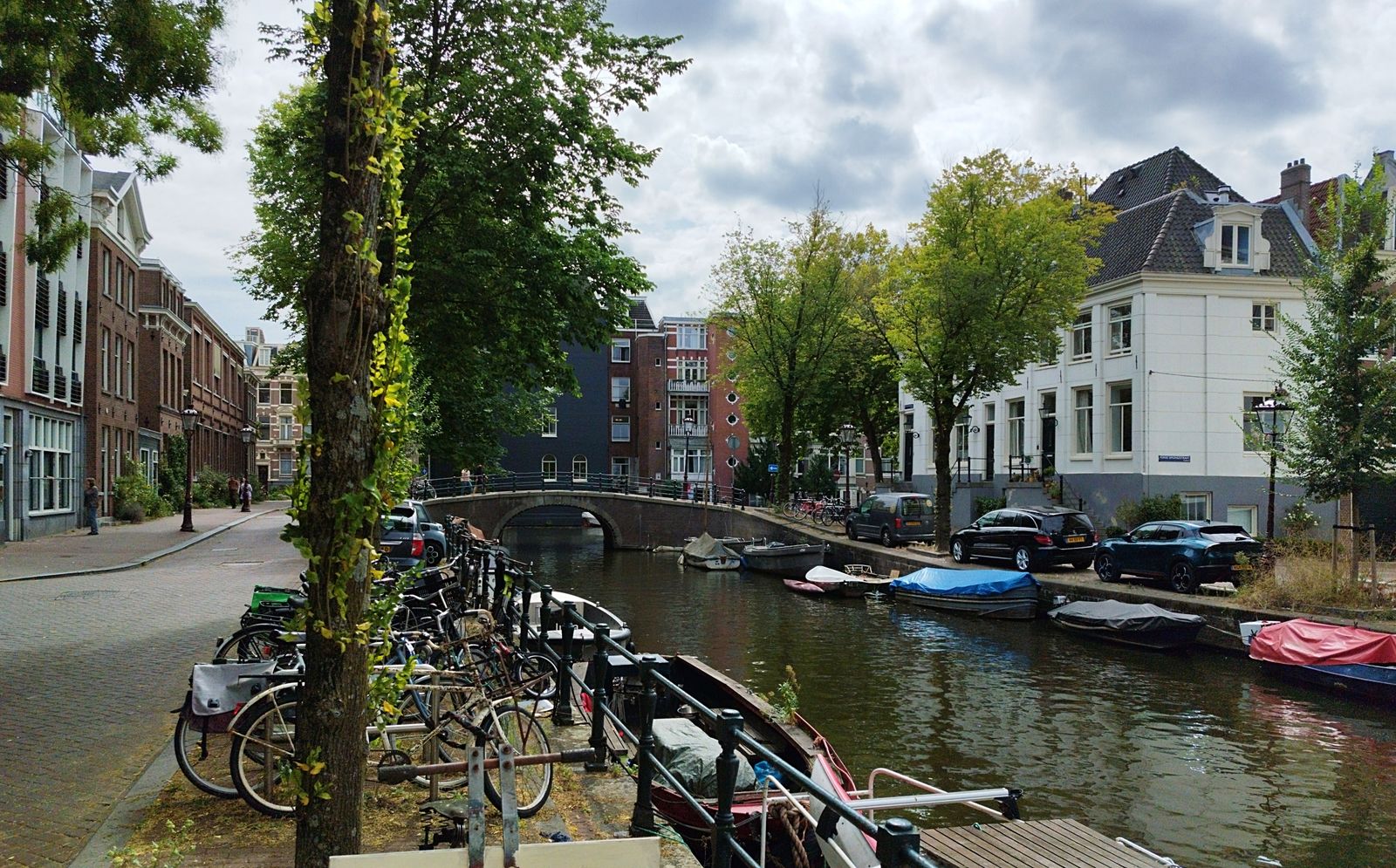 Amsterdam canal houses reflected in the water