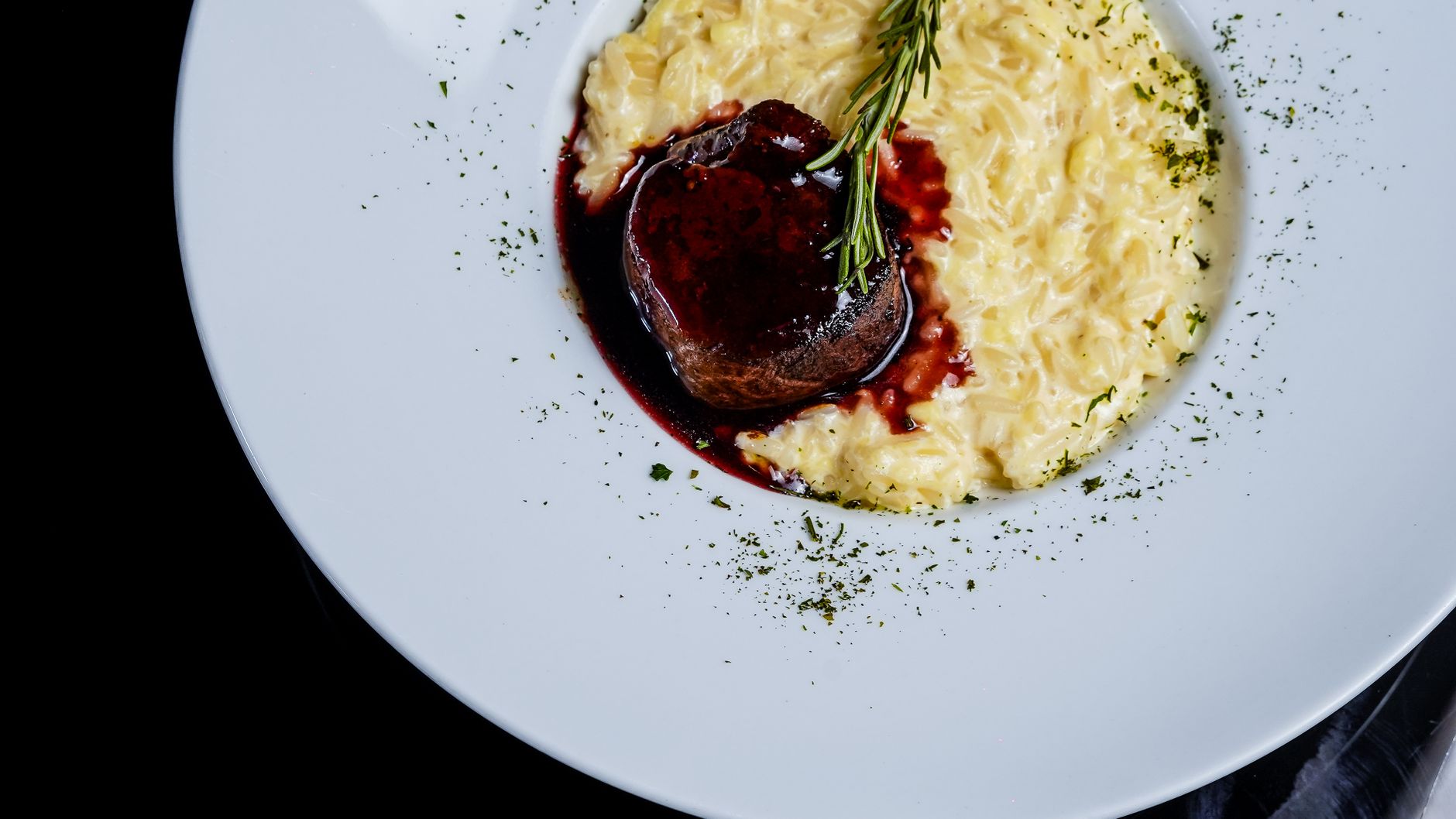 Peppercorn Crusted Filet with Crab Au Poivre plated