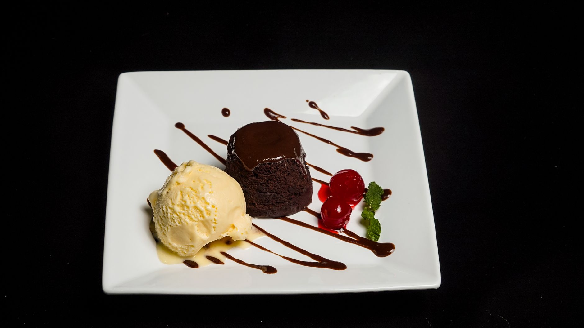 Brandy whipped cream topping on bread pudding