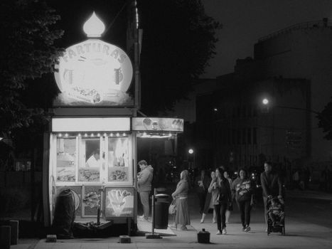 Black and white photo of a nighttime food stall in Matosinhos, Portugal.