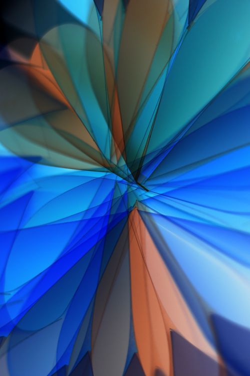 Free Abstract artwork featuring dynamic blue and orange patterns creating movement and depth. Stock Photo