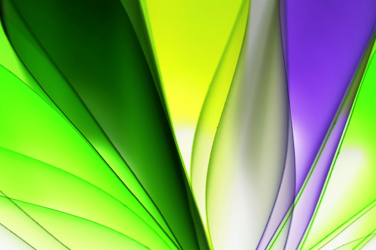 vibrantly colored abstract design featuring flowing green and purple s