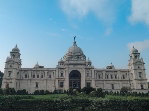 Free Capture the majestic Victoria Memorial in Kolkata on a clear sunny day. Stock Photo