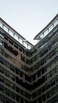 Symmetrical glass and metal building exterior in Istanbul, Türkiye.